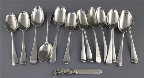 Fourteen assorted 18th and 19th century silver table spoons, 27 oz.